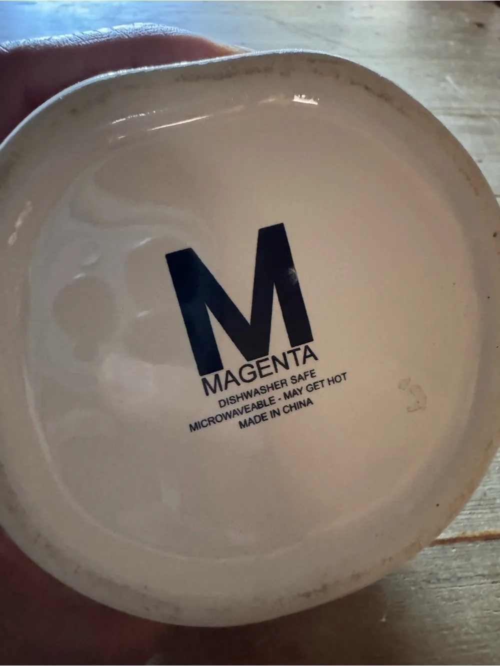 Magenta White Ceramic Dish with Pumpkin Orange inside Black Logo